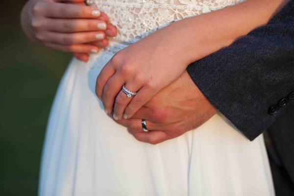 Bride and Groom holding hands Wrest Park August 2019