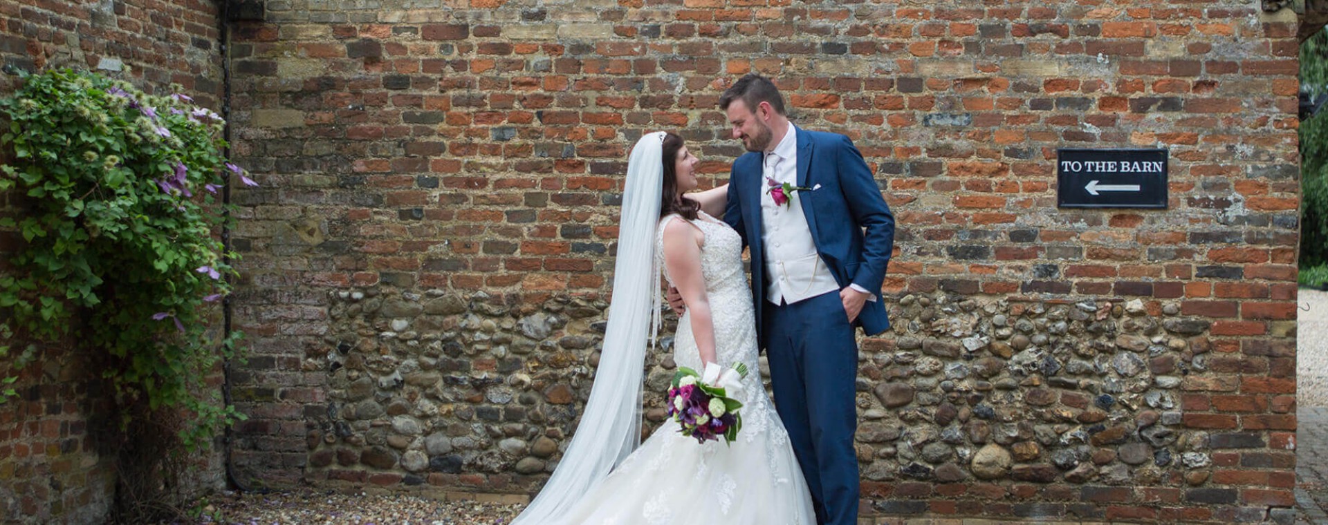 Husband and Wife pictured outside The Priory, Little Wymondley
