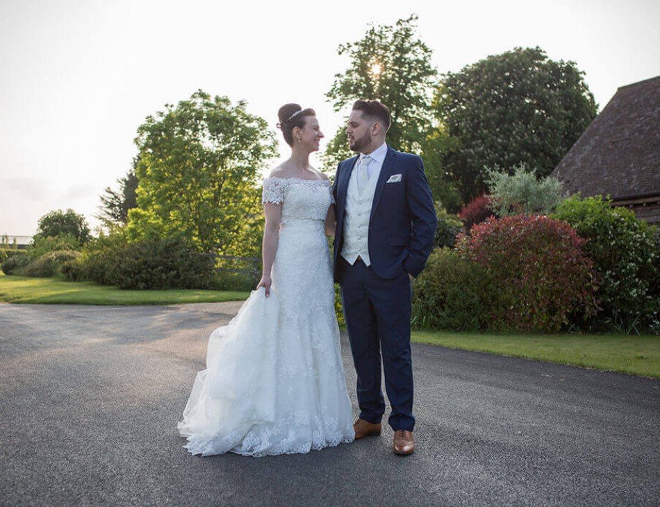 Husband and Wife stood outside Bassmead Manor Barns